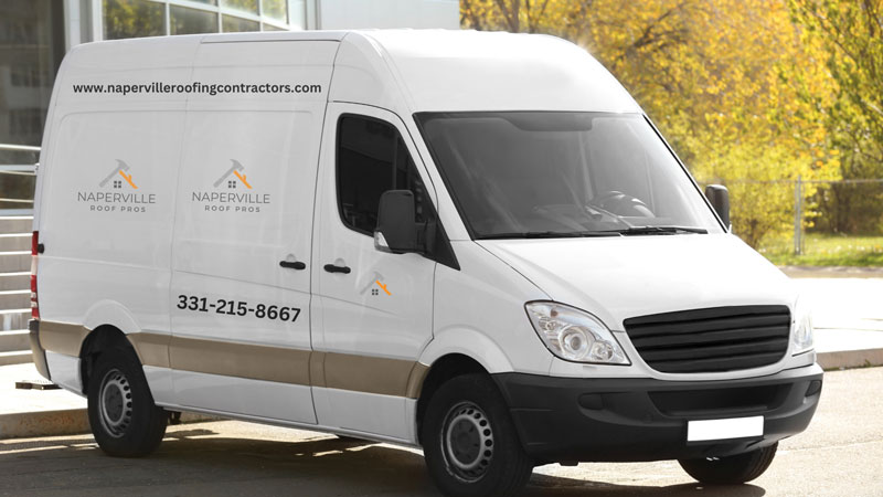 A white van in front of a building, associated with a roofing service operating in Naperville.